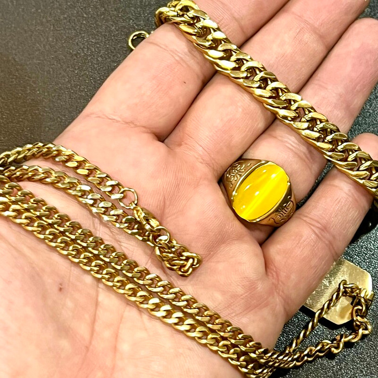 مشخصات قیمت و خرید ست انگشتر،دستبند و گردنبند و پلاک استیل طلایی رنگ مردانه