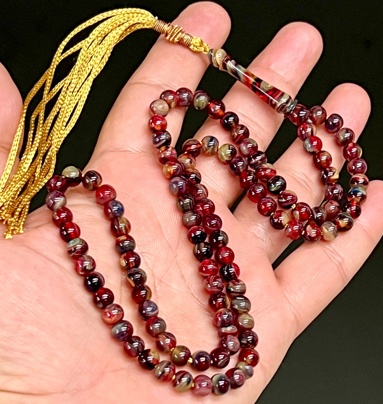 تسبیح کهربای پرچمی تراش استاد یعقوب ادب تراش ۵ ساله از شمش کهنه کد ۵۷۷