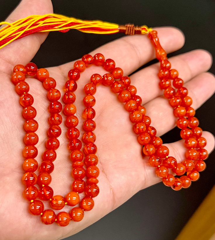 تسبیح کهربای پرتقالی رگه دار تراش ۵ ساله ترکیه کد ۵۸۴